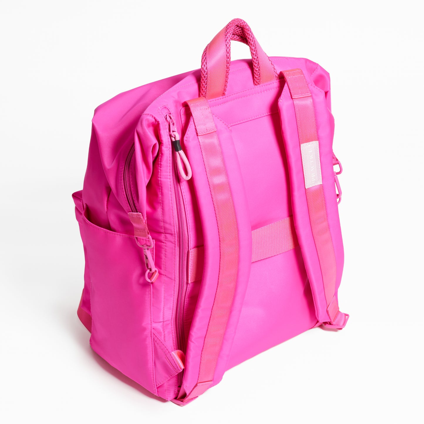 Practice The Karma Backpack in Dragonfruit hot pink color back of bag backpack straps