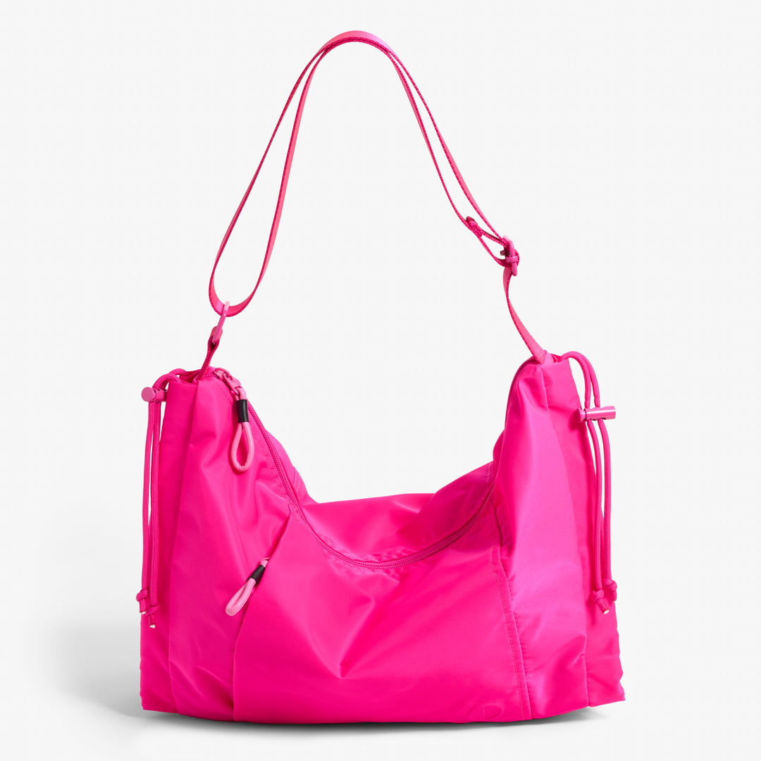 Practice Demilune Shoulder Sling bag in Dragonfruit hot pink color front of bag