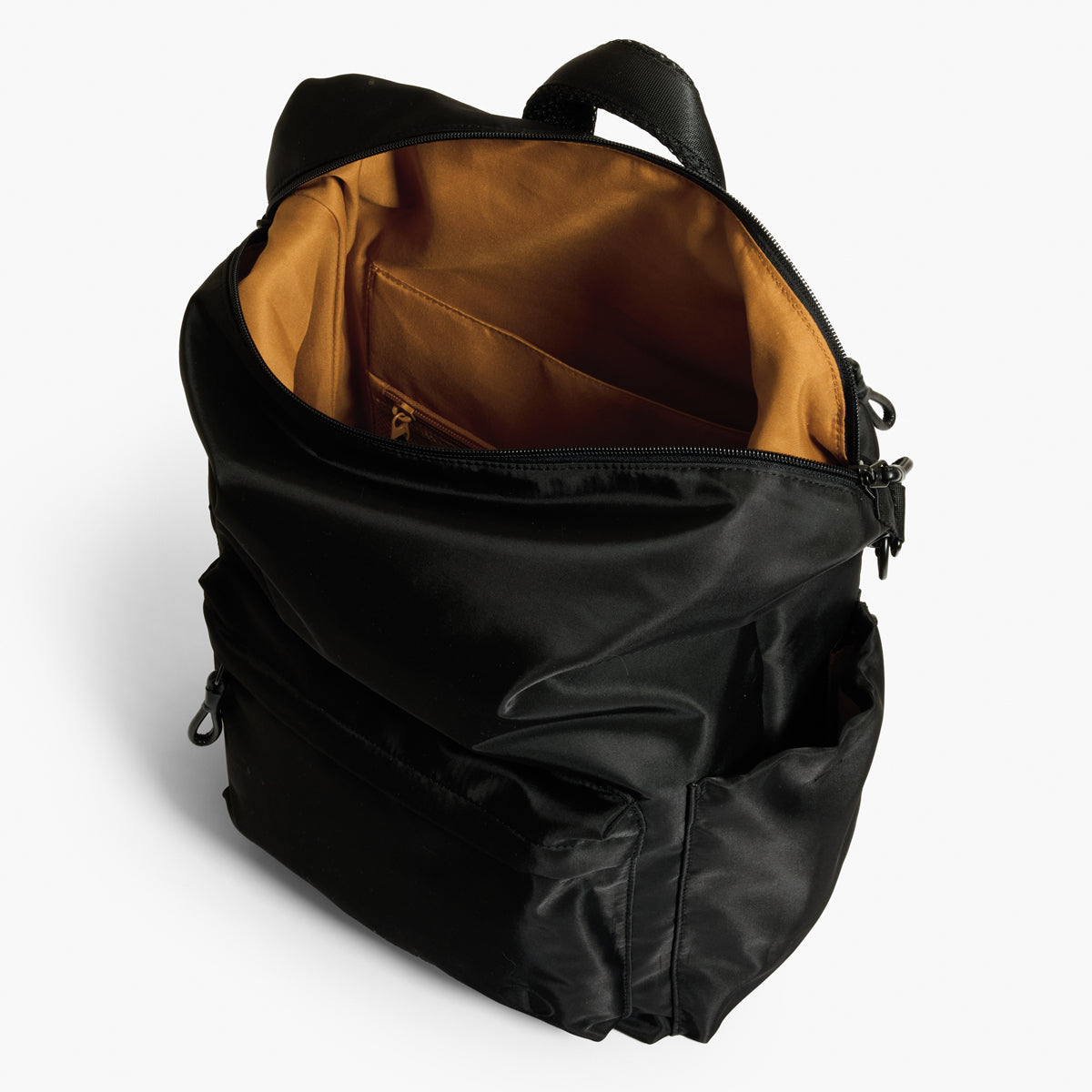 Practice Karma Medium Backpack in Eclipse black color top of bag interior view tan lining material