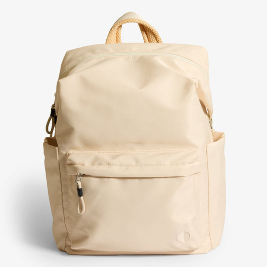 Practice Karma Medium Backpack in Tofu cream color