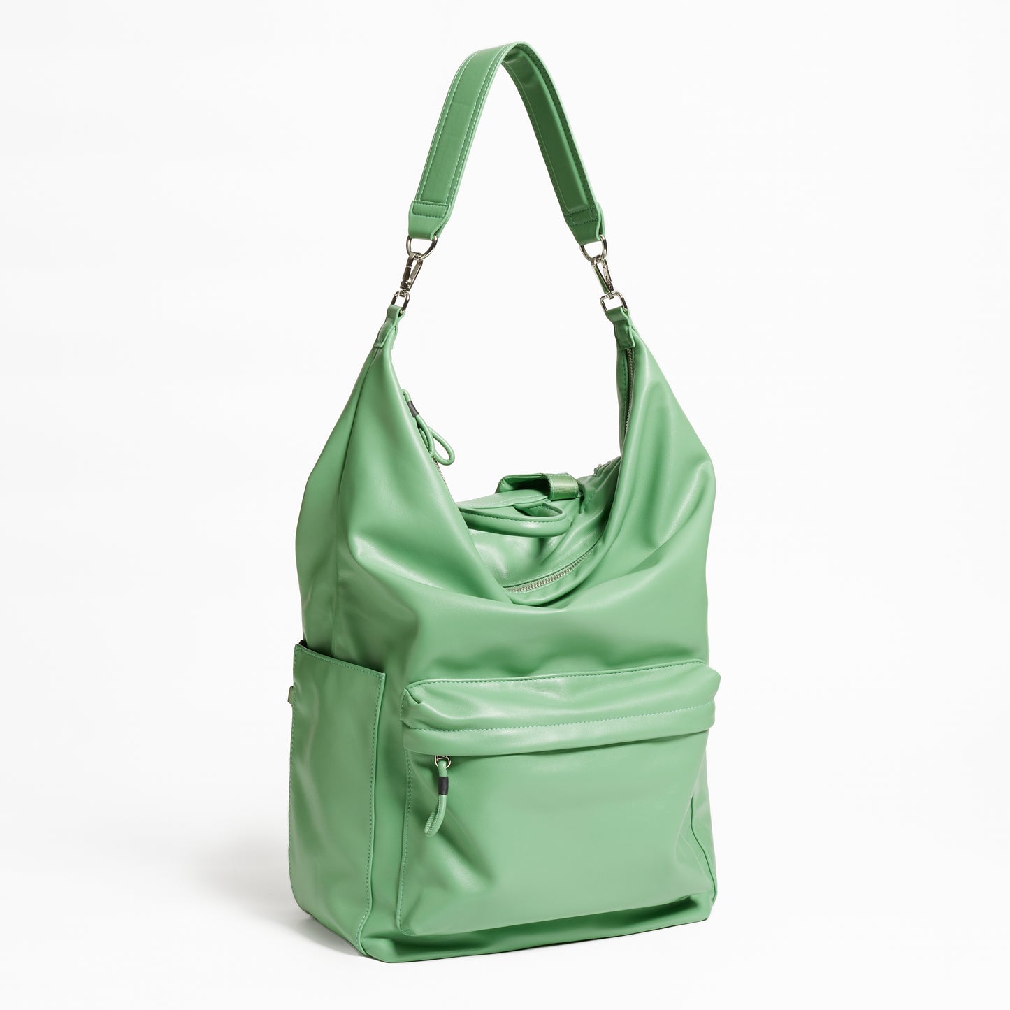 Front Facing view of the Karma Backpack in Aloe Green colored Vegan Leather. Backpack has a top handle and a convertible strap to carry your backpack as a tote for easy grab and go!