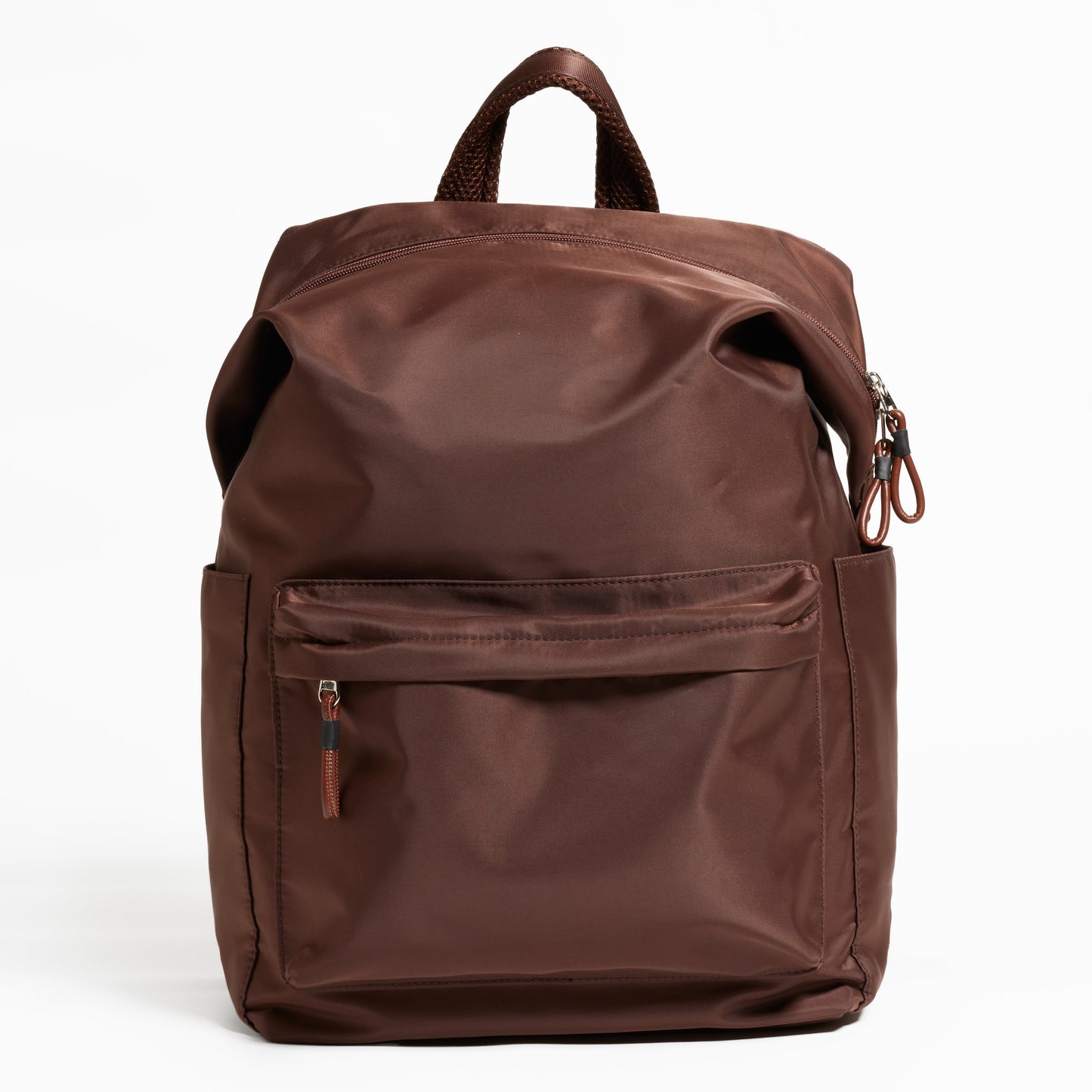 Front Facing view of the Karma Backpack in Woodland Brown Nylon. Backpack has a top handle and a convertible strap to carry your backpack as a tote for easy grab and go!