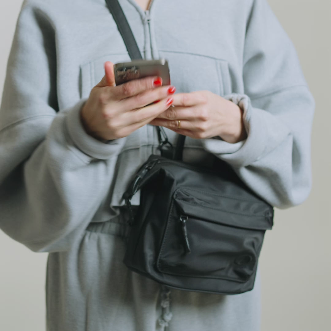 Practice Karma Mini Crossbody bag product video showcasing function